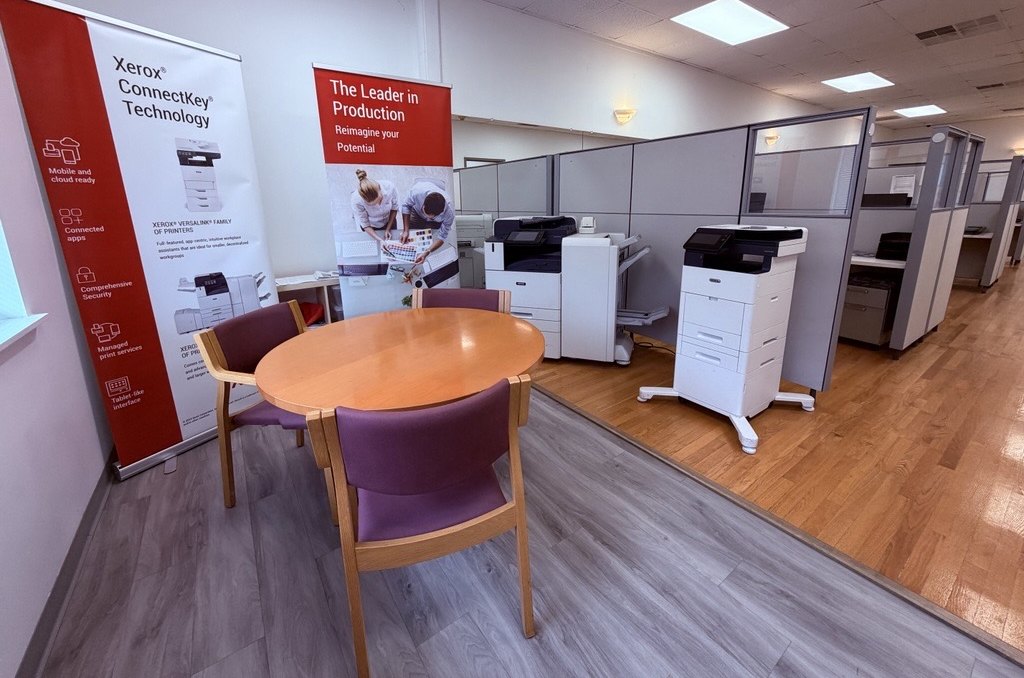 Customer meeting area in the ABS Xerox showroom, New Haven CT Seating area in the Advantage Business Systems showroom where customers review Xerox copier options with a rep